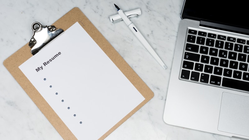 turn goals into systems — weekly planner, timer, water bottle, and a clean desk with one highlighted task